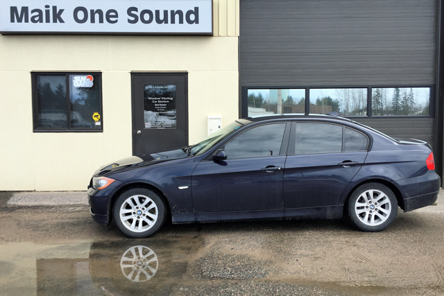 2012 BMW 325 with professional window tint in North Bay